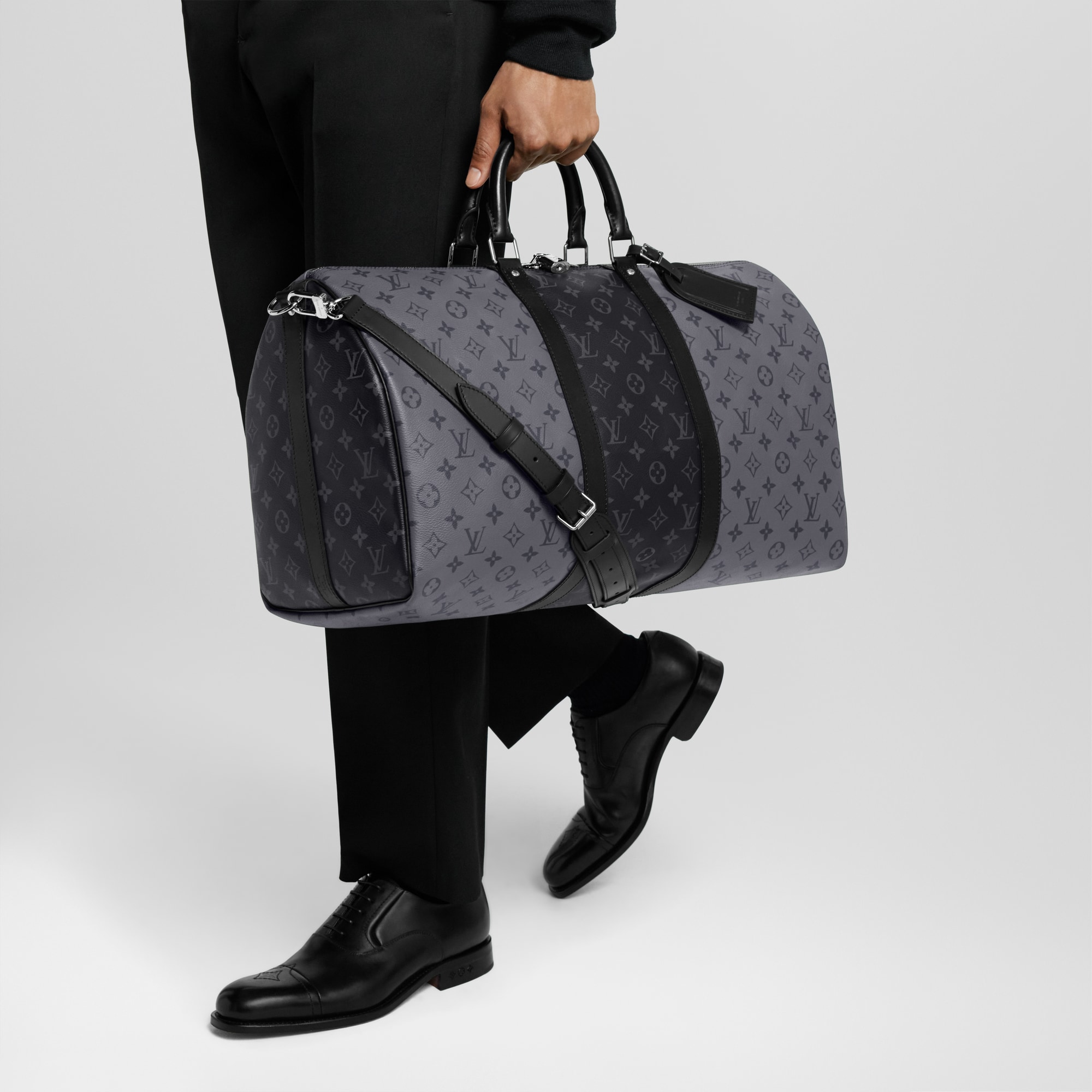 Men - Keepall Bandoulière 50 Monogram Eclipse Canvas Men Travel Softsided Luggage and Duffle Bags | LOUIS VUITTON (Product zoom)